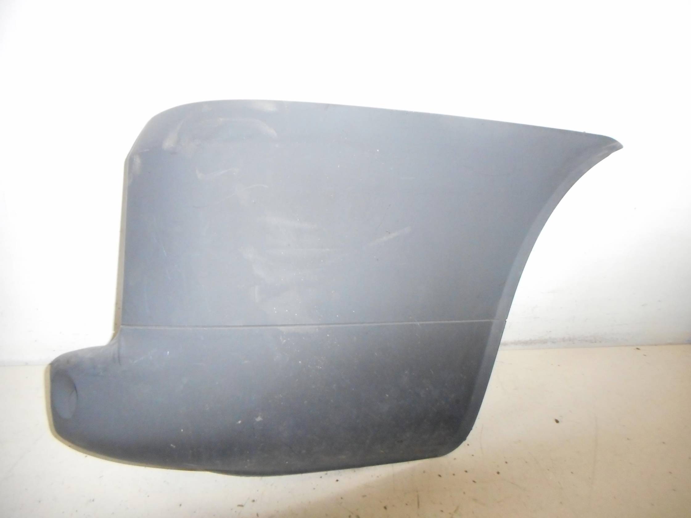 Paraurti post. lat. dx.